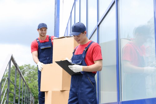 Packing boxes and wrapping household items for a Belsize Park move