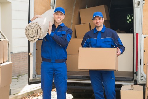 Careful loading of household items for a local move in Belsize Park