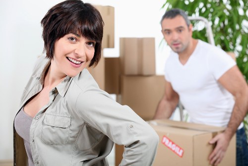 Packed boxes and furniture ready for transport in a removal van