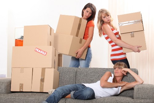 Office furniture and equipment being prepared for relocation in Belsize Park